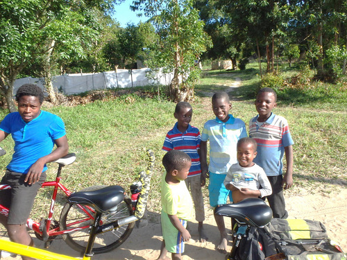 Kids gather to checkout our bike.